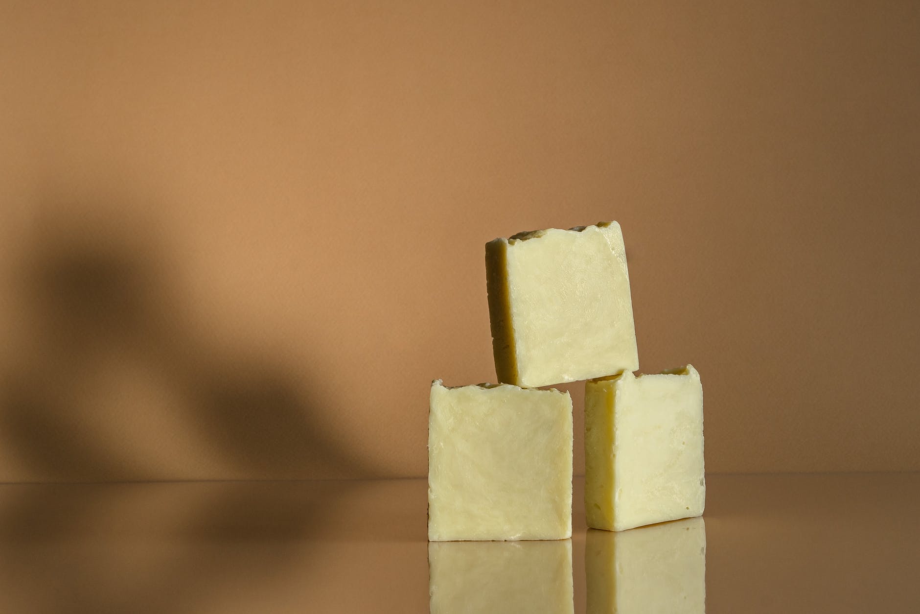 close up photograph of a stack of soap bars