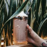 Goodbye Dark Circles: Aloe Vera's Amazing Benefits for Under-Eye Bags Cocktail with White Cream in Glass in Hand