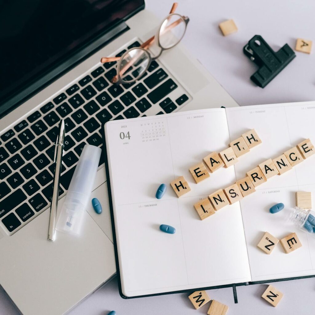 Blue Pills and Scrabble Tiles on a Planner