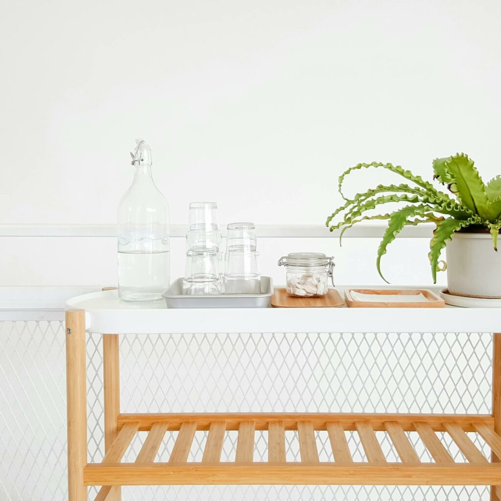 Clear Glass Bottle on Table