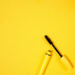 Flutter Those Lashes: How Aloe Vera Can Help Your Eyelashes Grow Yellow Mascara on Yellow Background